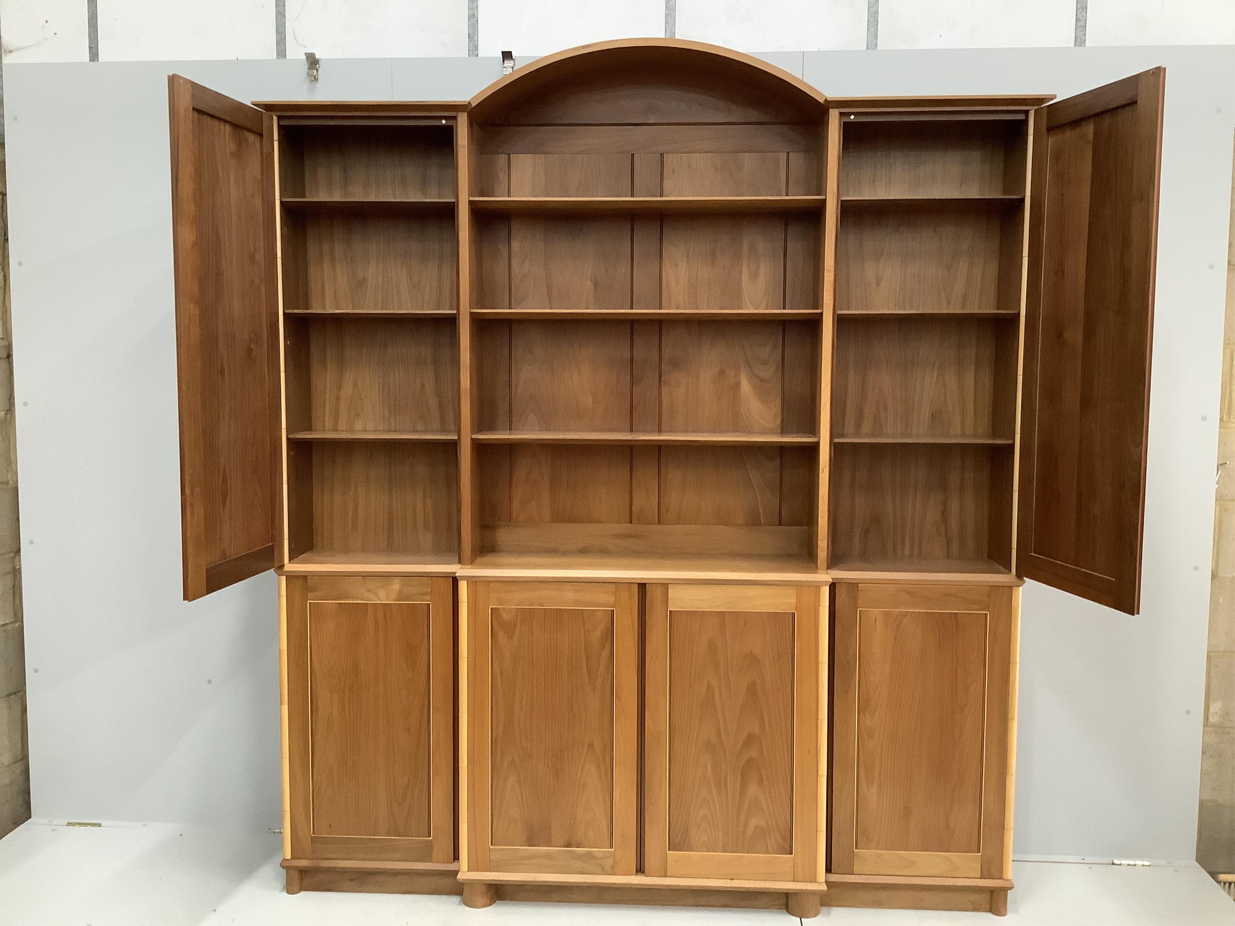 A contemporary walnut breakfront side cabinet, by Charles Thomson of Mayfield, width 204cm, depth 30cm, height 232cm. Condition - good